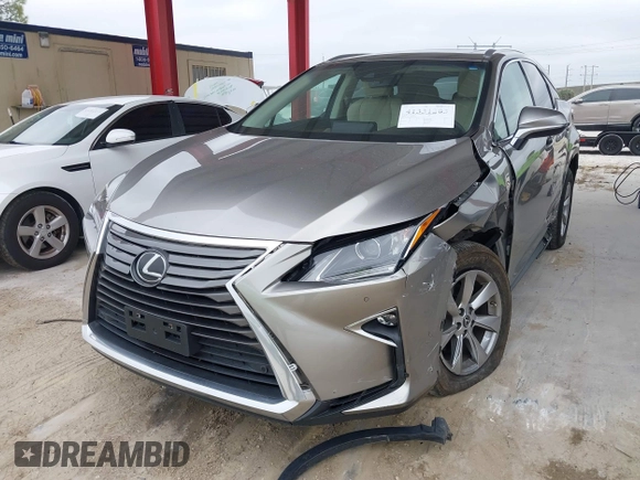 2018 Lexus RX 350 z VIN 2T2BZMCA3JC151296, wystawiony jako IAAI lot #41331203 z przebiegiem 73 051 mil mil oraz . Historia ofert i sprzedaży dostępna na DreamBid. Obrazek 17.