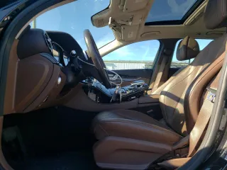 2017 Mercedes-Benz E with VIN WDDZH6GB2HA193337, listed as a Copart auction lot 52998045 with 100,309 mi miles and Salvage Title. Bid and sale history available at carsss.com. Image 7.