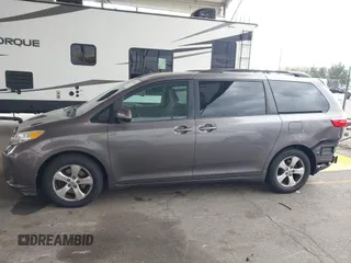 2015 Toyota Sienna LE AAS with VIN 5TDKK3DC8FS585957, listed as a IAAI auction lot 41888825 with 157,364 mi miles and . Bid and sale history available at DreamBid. Image 15.