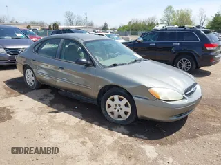 2003 Ford Taurus LX Standard z VIN 1FAFP52U63A235154, wystawiony jako IAAI lot #42084426 z przebiegiem 162 497 mil mil oraz . Historia ofert i sprzedaży dostępna na DreamBid. Obrazek 1.