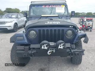 1997 Jeep Wrangler Sport with VIN 1J4FY19S2VP481780, listed as a IAAI auction lot 41822213 with 156,629 mi miles. Bid and sale history available at carsss.com. Image 12.