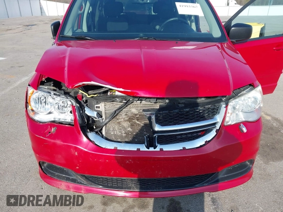 2013 Dodge Grand Caravan SE with VIN 2C4RDGBG9DR723999, listed as a IAAI auction lot 41993367 with 177,549 mi miles and . Bid and sale history available at DreamBid. Image 6.