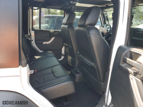 2017 Jeep Wrangler Unlimited Rubicon with VIN 1C4BJWFG7HL557799, listed as a Copart auction lot 77107544 with 172,022 mi miles and Salvage Title. Bid and sale history available at carsss.com. Image 10.