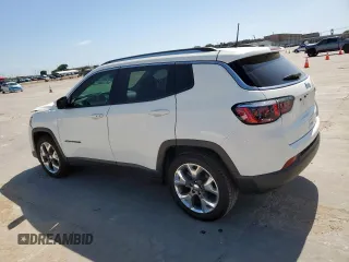 2019 Jeep Compass Limited with VIN 3C4NJCCB1KT664279, listed as a Copart auction lot 64853685 with 83,866 mi miles and Salvage title. Bid and sale history available at DreamBid. Image 2.