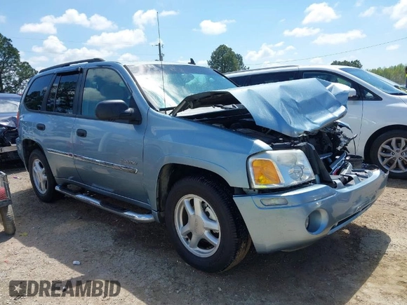 2006 GMC Envoy SLE with VIN 1GKDS13S362310613, listed as a IAAI auction lot 41881880 with 202,893 mi miles. Bid and sale history available at carsss.com. Image 1.