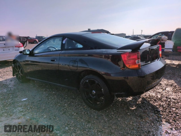 2002 Toyota Celica GT with VIN JTDDR32T620116886, listed as a Copart auction lot 82425874 with 203,196 mi miles and Salvage Title. Bid and sale history available at carsss.com. Image 2.