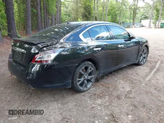 2013 Nissan Maxima S with VIN 1N4AA5AP0DC828375, listed as a IAAI auction lot 42215336 with 210,398 mi miles and . Bid and sale history available at DreamBid. Image 4.