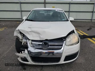 2009 Volkswagen Jetta SE z VIN 3VWRM71K39M057367, wystawiony jako Copart lot #58745235 z przebiegiem 130 647 mil mil oraz Szkoda całkowita • Salvage title. Historia ofert i sprzedaży dostępna na DreamBid. Obrazek 5.
