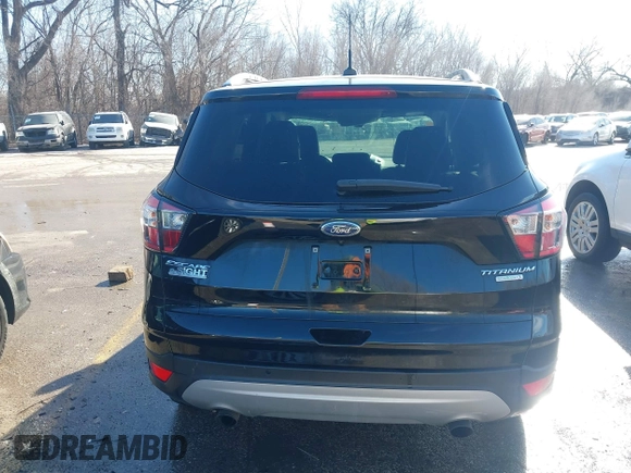 2017 Ford Escape Titanium with VIN 1FMCU0J94HUD58815, listed as a IAAI auction lot 41455415 with 80,421 mi miles and . Bid and sale history available at DreamBid. Image 17.