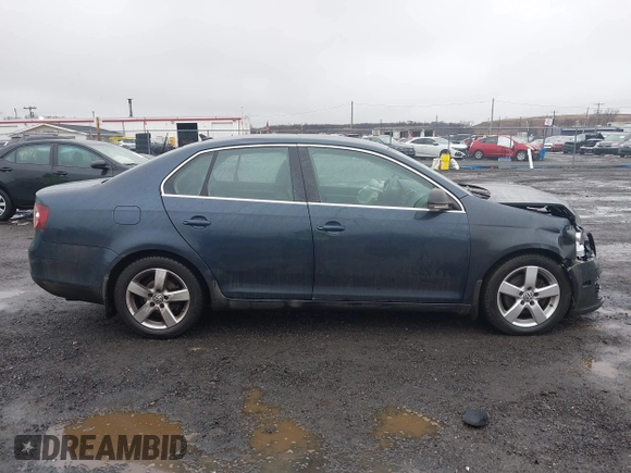 2009 Volkswagen Jetta SE z VIN 3VWRZ71K49M016683, wystawiony jako IAAI lot #41530644 z przebiegiem 106 148 mil mil oraz . Historia ofert i sprzedaży dostępna na DreamBid. Obrazek 13.