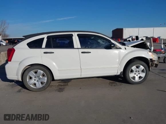 2007 Dodge Caliber SXT z VIN 1B3HB48B77D185971, wystawiony jako IAAI lot #41615355 z przebiegiem 165 367 mil mil oraz . Historia ofert i sprzedaży dostępna na DreamBid. Obrazek 14.