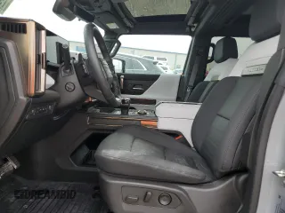2024 GMC Hummer EV 2X with VIN 1GKB0NDE3RU110966, listed as a Copart auction lot 79210474 with 3,569 mi miles and Salvage Title. Bid and sale history available at carsss.com. Image 7.