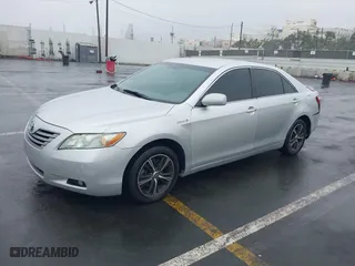 2008 Toyota Camry Hybrid with VIN 4T1BB46KX8U045725, listed as a IAAI auction lot 41186968 with 156,526 mi miles. Bid and sale history available at carsss.com. Image 2.