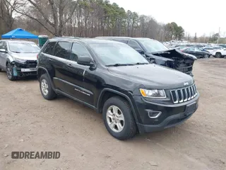 2014 Jeep Grand Cherokee Laredo with VIN 1C4RJFAG4EC371641, listed as a IAAI auction lot 42021087 with 248,608 mi miles. Bid and sale history available at carsss.com. Image 1.