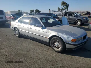 1999 BMW 7 Series 740il with VIN WBAGH833XXDP05142, listed as a Copart auction lot 74104394 with 0 mi miles and Salvage Title. Bid and sale history available at carsss.com. Image 4.