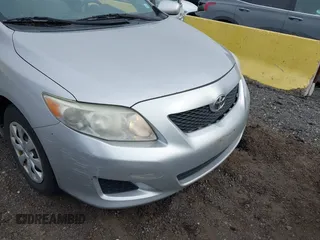 2010 Toyota Corolla with VIN 1NXBU4EE7AZ206138, listed as a IAAI auction lot 41607099 with 189,728 mi miles. Bid and sale history available at carsss.com. Image 6.