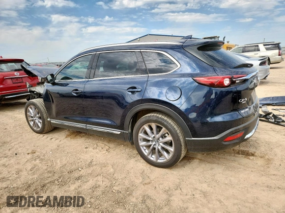 2023 Mazda CX-9 Carbon Edition with VIN JM3TCBDY1P0633964, listed as a Copart auction lot 60750015 with 34,657 mi miles and Salvage title. Bid and sale history available at DreamBid. Image 2.