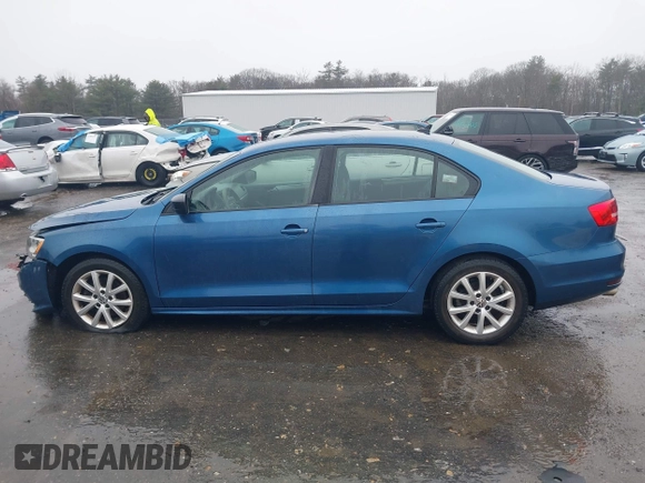 2015 Volkswagen Jetta Sedan 1.8T SE with VIN 3VWD17AJ7FM233634, listed as a IAAI auction lot 41942329 with 128,996 mi miles. Bid and sale history available at carsss.com. Image 14.