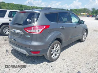 2013 Ford Escape SEL with VIN 1FMCU0HXXDUD51754, listed as a IAAI auction lot 42696434 with 145,705 mi miles and . Bid and sale history available at DreamBid. Image 4.