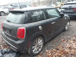 2019 MINI Hardtop Cooper S z VIN WMWXP7C54K2A53043, wystawiony jako IAAI lot #41794566 z przebiegiem 42 278 mil mil oraz . Historia ofert i sprzedaży dostępna na DreamBid. Obrazek 4.