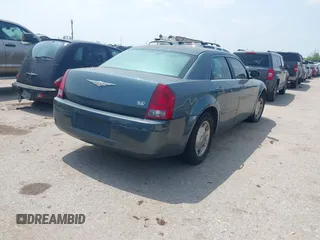 2006 Chrysler 300 Touring with VIN 2C3KA53G16H151319, listed as a IAAI auction lot 41917412 with 245,741 mi miles. Bid and sale history available at carsss.com. Image 4.