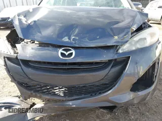 2013 Mazda 5 Sport z VIN JM1CW2BL3D0155694, wystawiony jako IAAI lot #41641169 z przebiegiem Nie podano mil oraz . Historia ofert i sprzedaży dostępna na DreamBid. Obrazek 6.