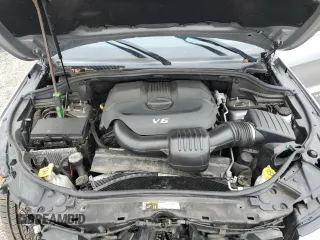 2015 Jeep Grand Cherokee Overland with VIN 1C4RJECG4FC808241, listed as a Copart auction lot 59699685 with 67,542 mi miles and Salvage title. Bid and sale history available at DreamBid. Image 12.