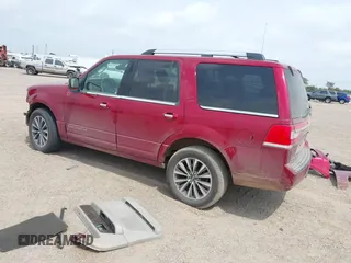 2015 Lincoln Navigator z VIN 5LMJJ2HT3FEJ07379, wystawiony jako IAAI lot #42032471 z przebiegiem 115 954 mil mil oraz . Historia ofert i sprzedaży dostępna na DreamBid. Obrazek 3.