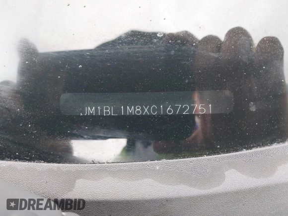 2012 Mazda 3 i Grand Touring z VIN JM1BL1M8XC1672751, wystawiony jako IAAI lot #42298766 z przebiegiem 129 056 mil mil oraz . Historia ofert i sprzedaży dostępna na DreamBid. Obrazek 9.