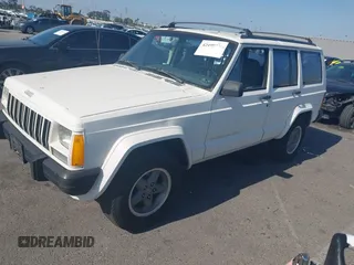 1996 Jeep Cherokee Sport with VIN 1J4FT68S7TL265733, listed as a IAAI auction lot 42499228 with 230,001 mi miles and . Bid and sale history available at DreamBid. Image 2.
