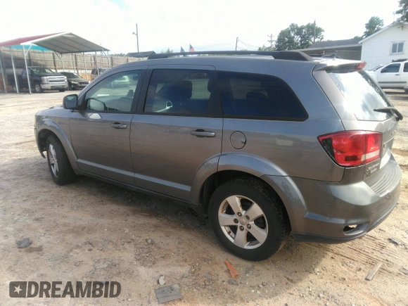 2012 Dodge Journey SXT with VIN 3C4PDCBG9CT153241, listed as a IAAI auction lot 42640265 with 184,719 mi miles and . Bid and sale history available at DreamBid. Image 3.