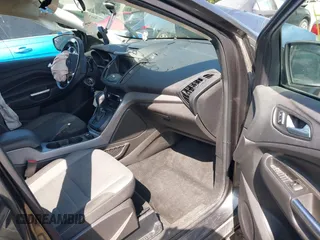2016 Ford Escape SE with VIN 1FMCU9GX5GUC24730, listed as a IAAI auction lot 40172504 with 139,925 mi miles. Bid and sale history available at carsss.com. Image 5.