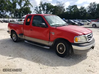 2003 Ford F-150 XL with VIN 1FTRX07WX3KD51374, listed as a Copart auction lot 71796464 with 130,319 mi miles and Salvage Title. Bid and sale history available at carsss.com. Image 4.