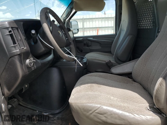2013 Chevrolet Express Cargo with VIN 1GCWGFBA4D1105381, listed as a Copart auction lot 60138065 with 209,922 mi miles and Salvage title. Bid and sale history available at DreamBid. Image 7.