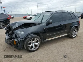 2012 BMW X5 35i z VIN 5UXZV4C5XCL759036, wystawiony jako Copart lot #58137395 z przebiegiem 162 366 mil mil oraz Szkoda całkowita • Salvage title. Historia ofert i sprzedaży dostępna na DreamBid. Obrazek 1.