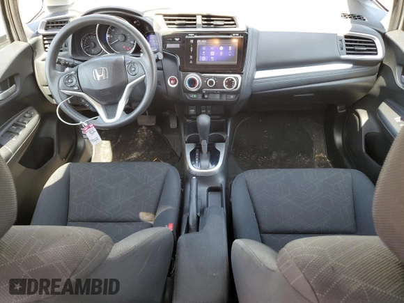 2015 Honda Fit EX-L z VIN 3HGGK5H81FM734945, wystawiony jako Copart lot #61920835 z przebiegiem 59 891 mil mil oraz Szkoda całkowita • Salvage title. Historia ofert i sprzedaży dostępna na DreamBid. Obrazek 8.
