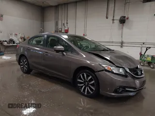 2015 Honda Civic EX-L z VIN 2HGFB2F92FH519353, wystawiony jako IAAI lot #42091694 z przebiegiem 135 359 mil mil oraz . Historia ofert i sprzedaży dostępna na DreamBid. Obrazek 1.