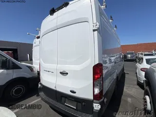2020 Ford Transit Cargo with VIN 1FTBW3X82LKB36188, listed as a IAAI auction lot 42828633 with 71,589 mi miles and . Bid and sale history available at DreamBid. Image 7.