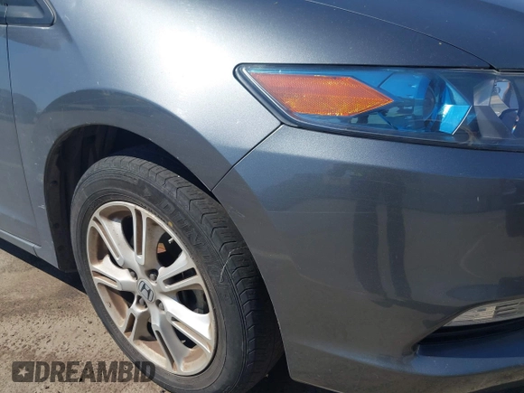 2010 Honda Insight EX with VIN JHMZE2H72AS015870, listed as a IAAI auction lot 42762384 with 58,121 mi miles and . Bid and sale history available at DreamBid. Image 14.