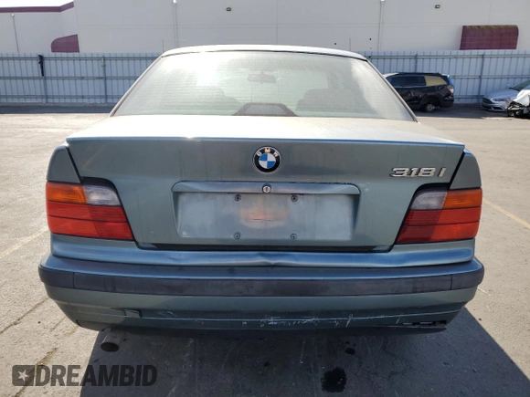 1998 BMW 3 Series 318i with VIN WBACC9322WEE60455, listed as a Copart auction lot 75950324 with 328,714 mi miles and Salvage Title. Bid and sale history available at carsss.com. Image 6.