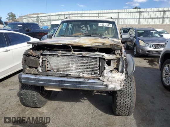 1989 Jeep Cherokee with VIN 1J4FJ38L2KL462983, listed as a Copart auction lot 48012545 with Not provided miles and Salvage title. Bid and sale history available at DreamBid. Image 5.