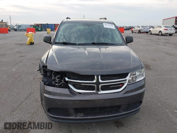 2018 Dodge Journey SE with VIN 3C4PDCABXJT170150, listed as a IAAI auction lot 40715756 with 113,330 mi miles and . Bid and sale history available at DreamBid. Image 12.