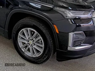 2022 Chevrolet Traverse LT Cloth with VIN 1GNEVMKW7NJ123108, listed as a IAAI auction lot 42854233 with 63,624 mi miles and . Bid and sale history available at DreamBid. Image 3.