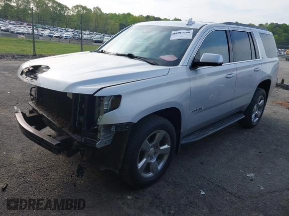 2019 Chevrolet Tahoe LT with VIN 1GNSCBKCXKR219413, listed as a IAAI auction lot 42013260 with 92,886 mi miles and . Bid and sale history available at DreamBid. Image 2.