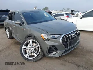 2020 Audi Q3 S line Premium with VIN WA1DECF36L1036158, listed as a IAAI auction lot 42597988 with 26,729 mi miles and . Bid and sale history available at DreamBid. Image 1.