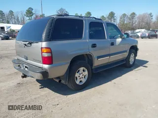 2003 Chevrolet Tahoe LS z VIN 1GNEK13T13J144304, wystawiony jako IAAI lot #41784000 z przebiegiem 363 478 mil mil oraz . Historia ofert i sprzedaży dostępna na DreamBid. Obrazek 4.