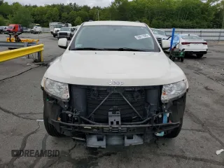 2011 Jeep Grand Cherokee Laredo with VIN 1J4RR4GG9BC515467, listed as a Copart auction lot 58411085 with 112,558 mi miles and Salvage title. Bid and sale history available at DreamBid. Image 5.