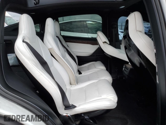 2016 Tesla Model X 70D with VIN 5YJXCAE28GF017100, listed as a Copart auction lot 50081235 with 126,962 mi miles and Salvage Title. Bid and sale history available at DreamBid. Image 12.