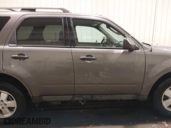 2011 Ford Escape XLT с VIN 1FMCU9DG3BKA18878, выставлен на аукционе IAAI как лот 41549599 с пробегом 114 576 миль миль и . История ставок и продаж доступна на DreamBid. Изображение 13.
