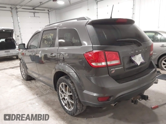 2019 Dodge Journey GT with VIN 3C4PDDEG7KT809789, listed as a IAAI auction lot 41532399 with 68,827 mi miles and . Bid and sale history available at carsss.com. Image 3.